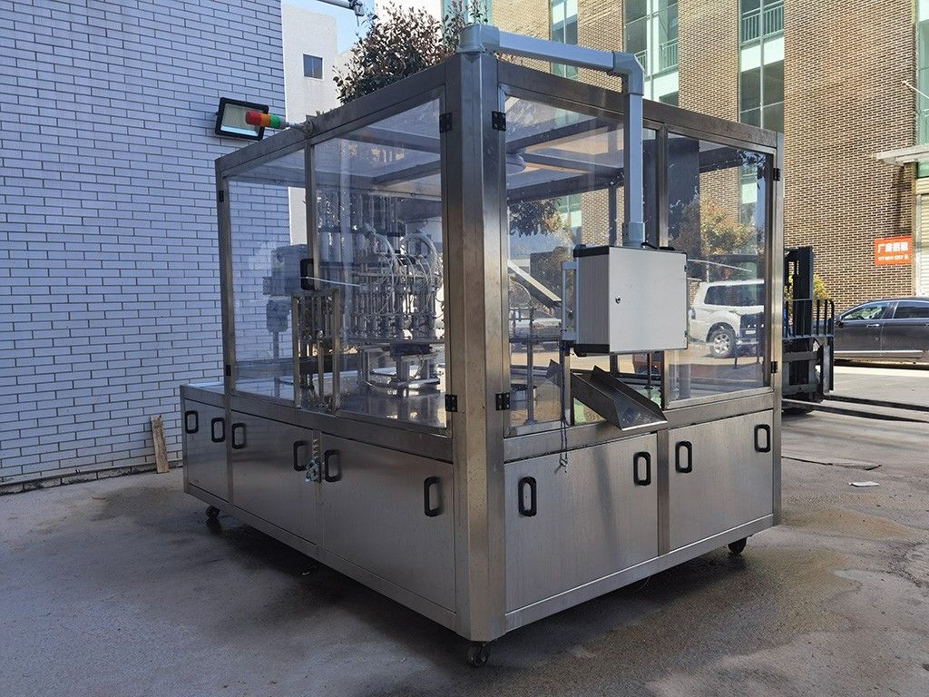 1759212793939762.jpg LG-620 斜嘴袋灌裝旋蓋機.jpg